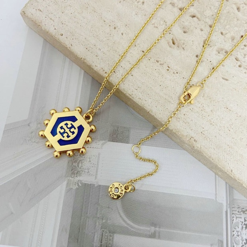 Tory Burch Gold Necklace with Blue Hexagon Pendant